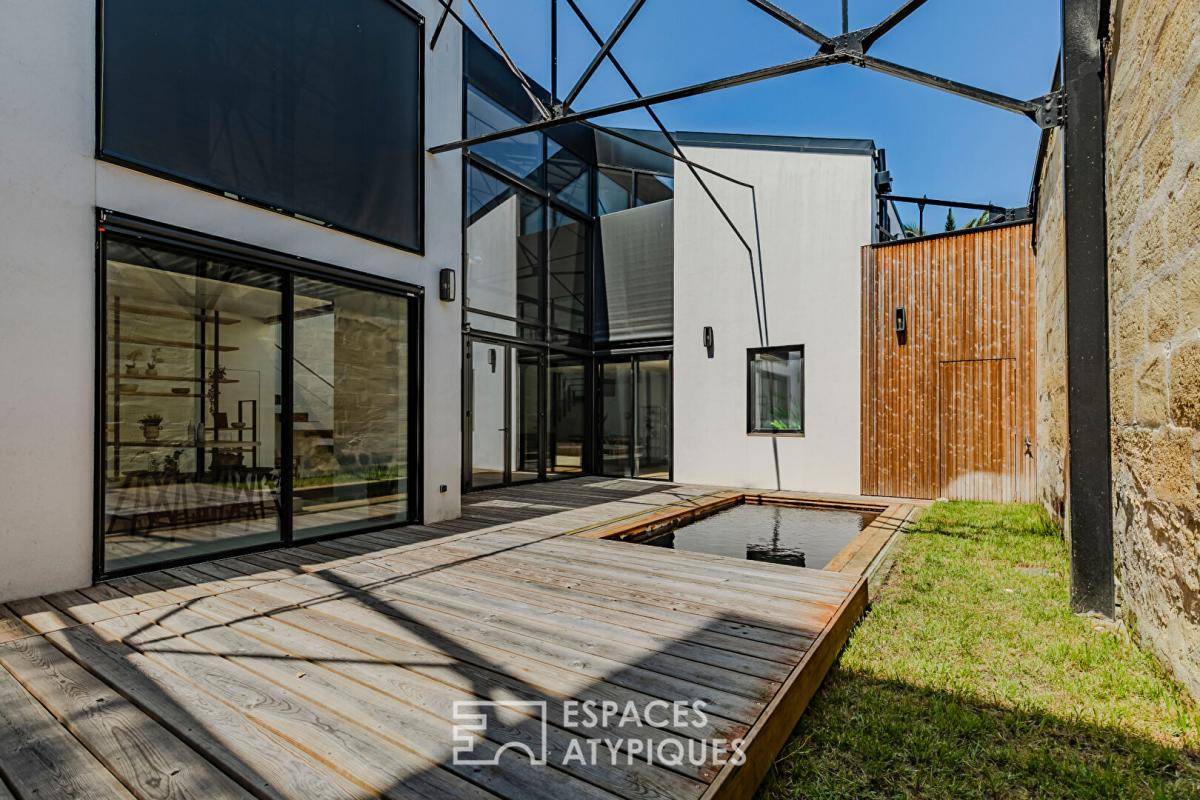 Image de l'annonce Loft sculptural avec terrasse et piscine aux…