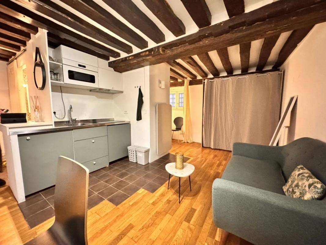 Image de l'annonce Paris 75004 - Charmant deux-pièces en RDC…