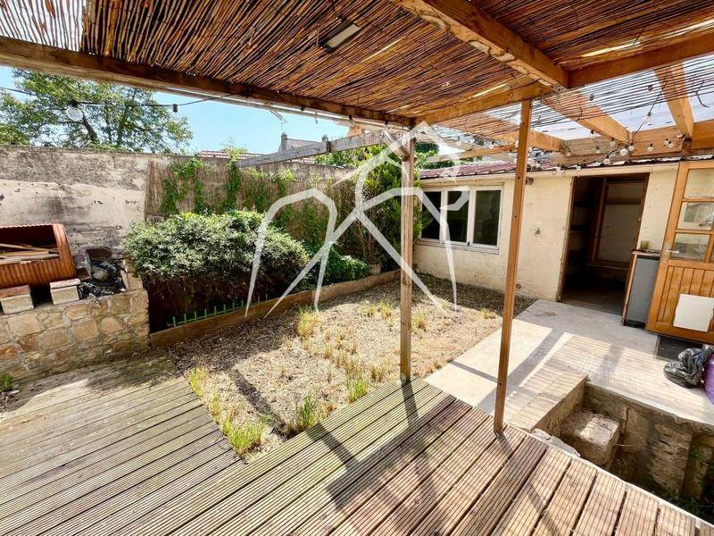 Image de l'annonce Maison mitoyenne avec terrasse, jardinet et atelier…